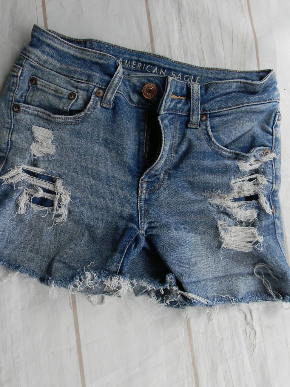 American Eagle Midi Denim Shorts DISTRESSED Raw Hem NEXT LEVEL Stretch SZ 2